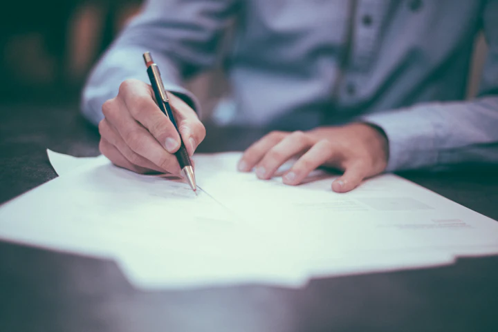 Credit report documents being reviewed at a desk